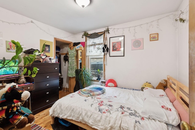 bedroom featuring hardwood / wood-style floors