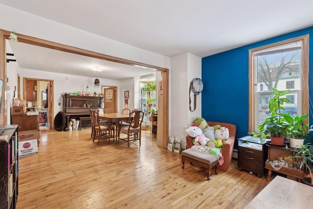 living area with light hardwood / wood-style flooring