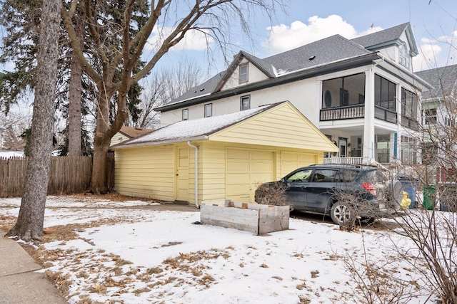 view of snow covered house