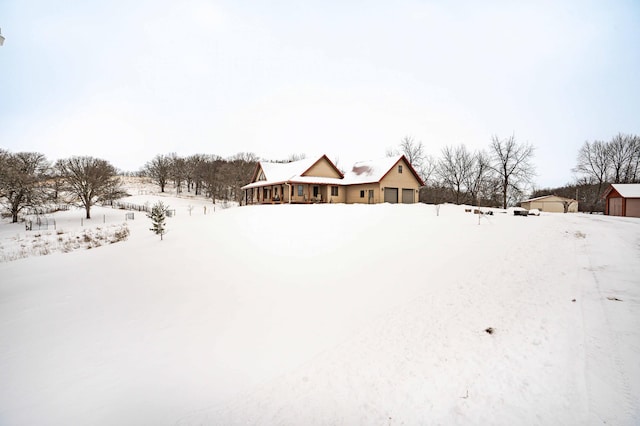 view of yard layered in snow