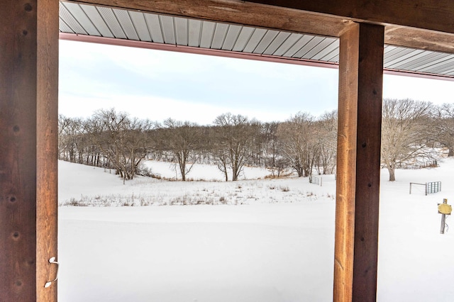 view of yard layered in snow