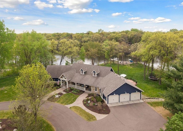 bird's eye view with a water view