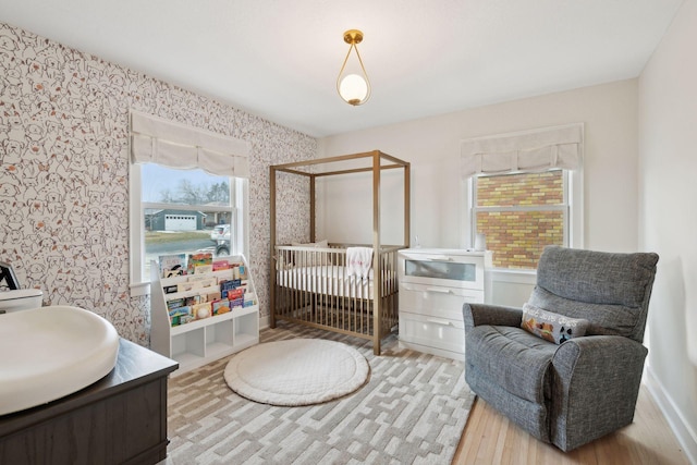 bedroom with light hardwood / wood-style flooring