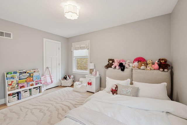 bedroom featuring hardwood / wood-style flooring