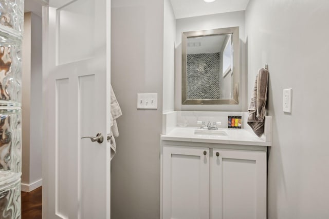 bathroom featuring vanity and hardwood / wood-style floors