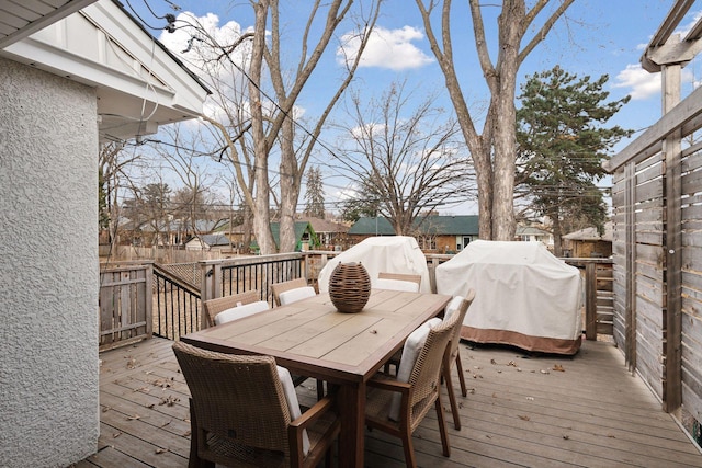 wooden terrace with area for grilling