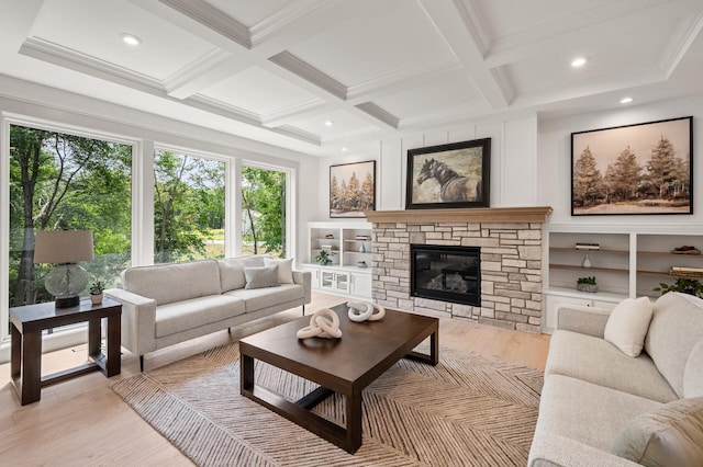 living room with coffered ceiling, beam ceiling, and light wood-type flooring