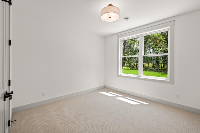 view of carpeted spare room