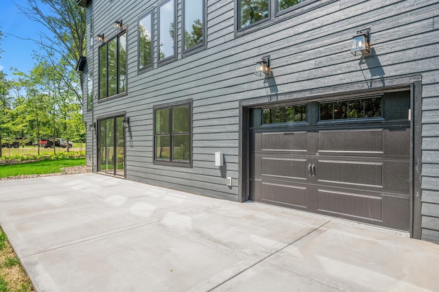 view of side of home featuring a patio area