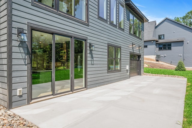 view of patio with a garage