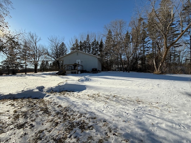 view of yard covered in snow