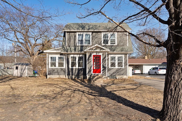 view of front of house with a shed