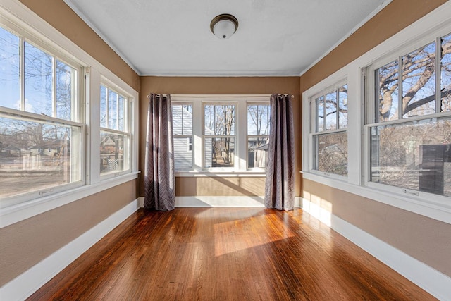 unfurnished sunroom with a healthy amount of sunlight