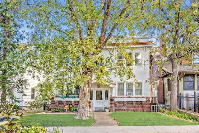 3421 Hennepin Ave Unit 5, Minneapolis, MN 55408 - view of front facade with stucco siding and cooling unit