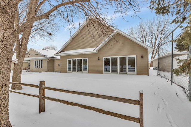 view of snow covered property