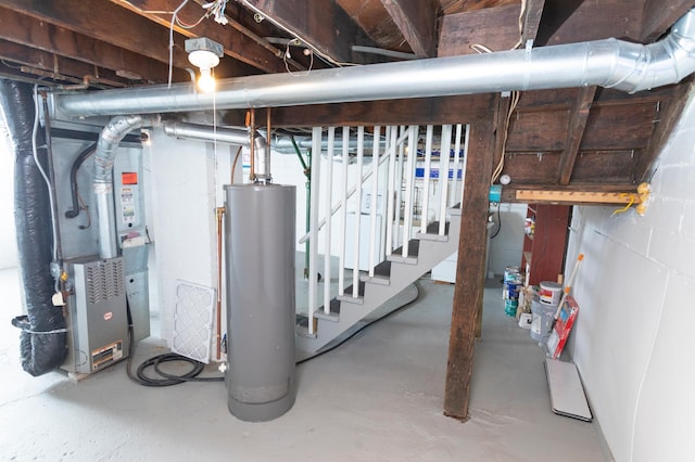 basement with heating unit and gas water heater