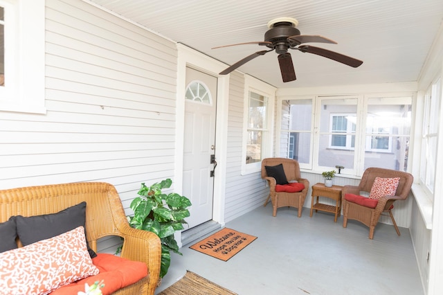 sunroom / solarium with ceiling fan