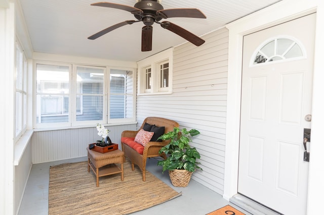 sunroom / solarium with ceiling fan