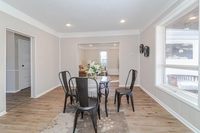 dining area with light wood-type flooring