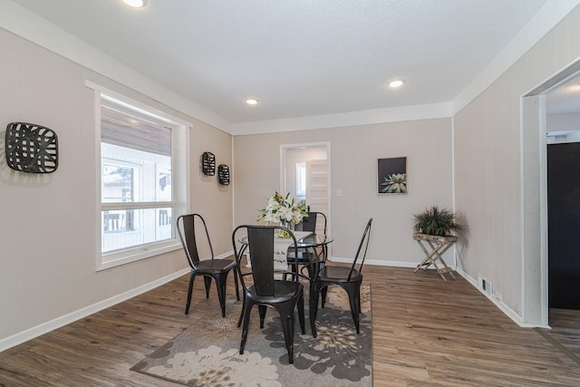 dining room featuring dark hardwood / wood-style flooring