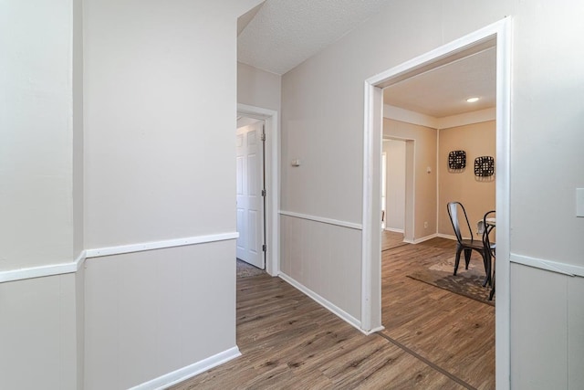 hallway featuring hardwood / wood-style floors