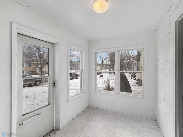 view of unfurnished sunroom