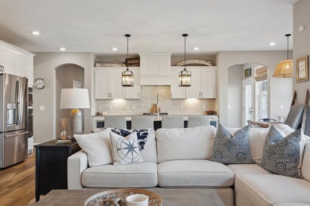 living room with light hardwood / wood-style floors