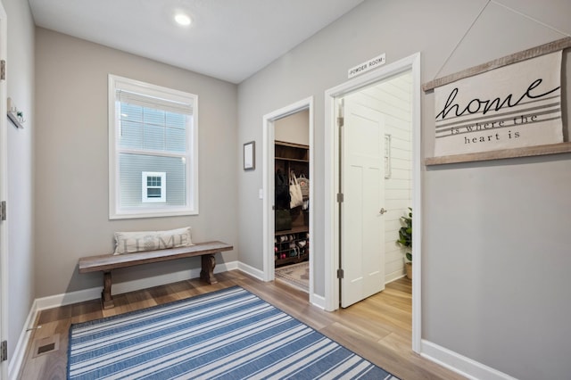 hall featuring hardwood / wood-style flooring