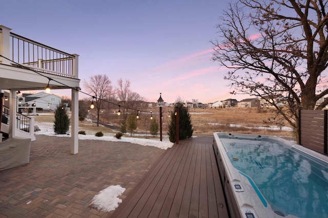 view of deck at dusk