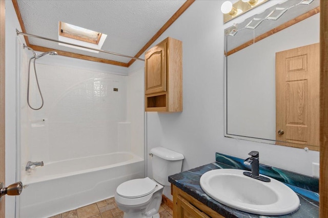 full bathroom featuring shower / bath combination, a skylight, vanity, a textured ceiling, and toilet