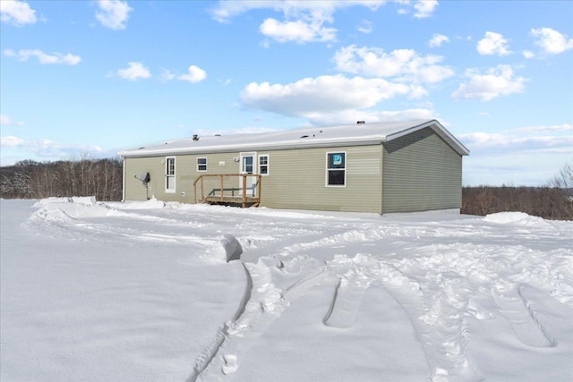 view of snow covered property