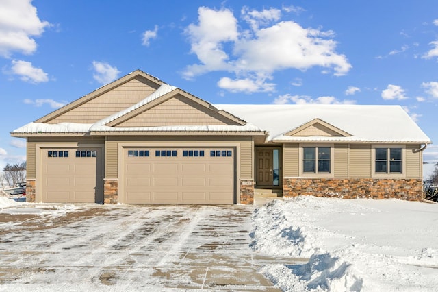 view of front of home with a garage