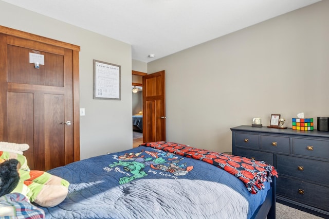 bedroom with light colored carpet