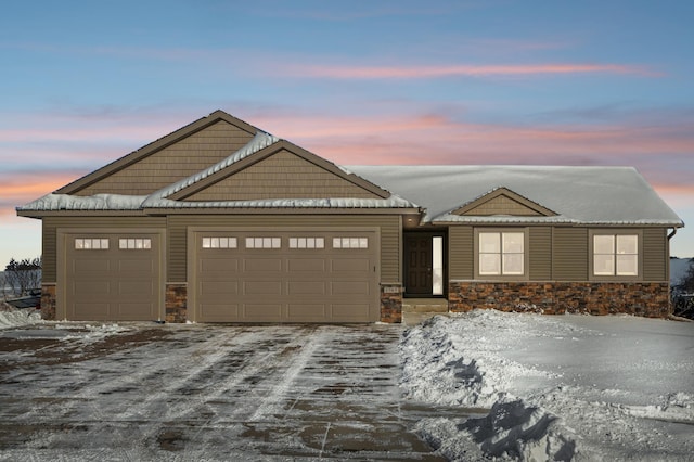 view of front of property featuring a garage