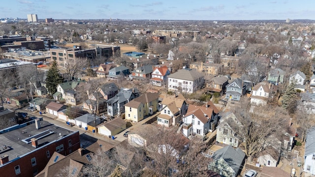 birds eye view of property with a residential view