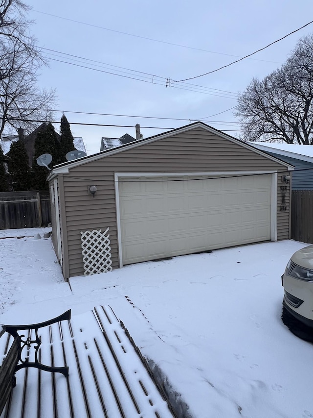 view of snow covered garage