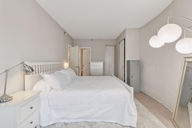 bedroom featuring light hardwood / wood-style flooring