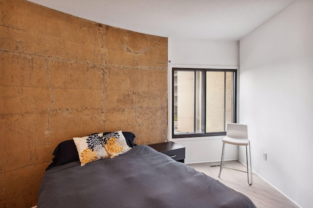 unfurnished bedroom featuring hardwood / wood-style flooring