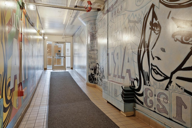 hallway with light tile patterned flooring