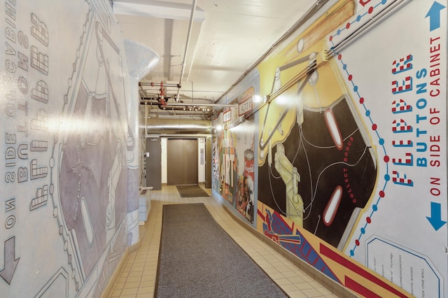 corridor featuring light tile patterned floors