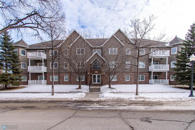 view of snow covered property