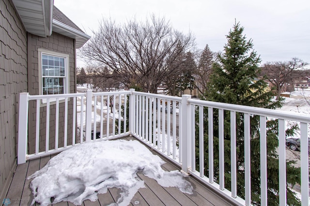 view of snow covered deck