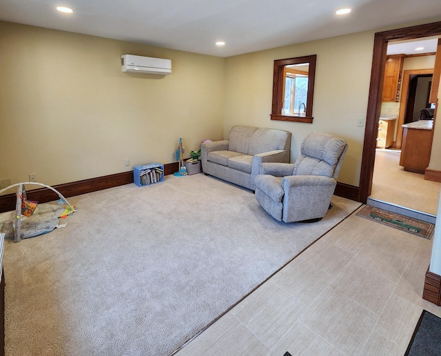 living area with recessed lighting, baseboards, a wall unit AC, and carpet flooring