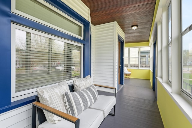 sunroom / solarium with wood ceiling