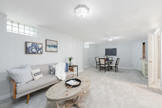 living room featuring light carpet