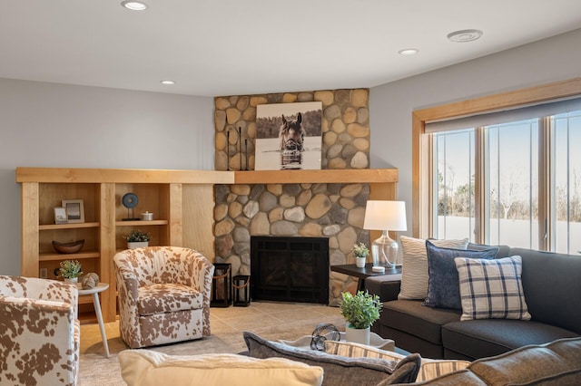 living room featuring a fireplace