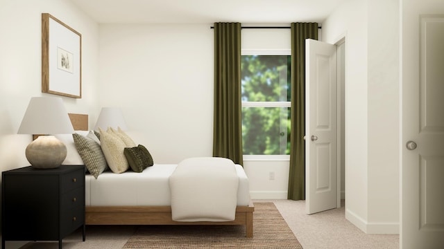 bedroom featuring light colored carpet