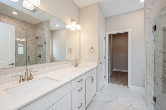 bathroom with vanity and an enclosed shower