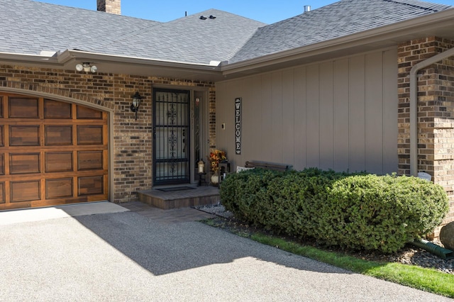 entrance to property featuring a garage