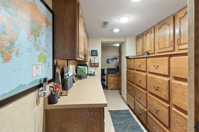 kitchen with a textured ceiling